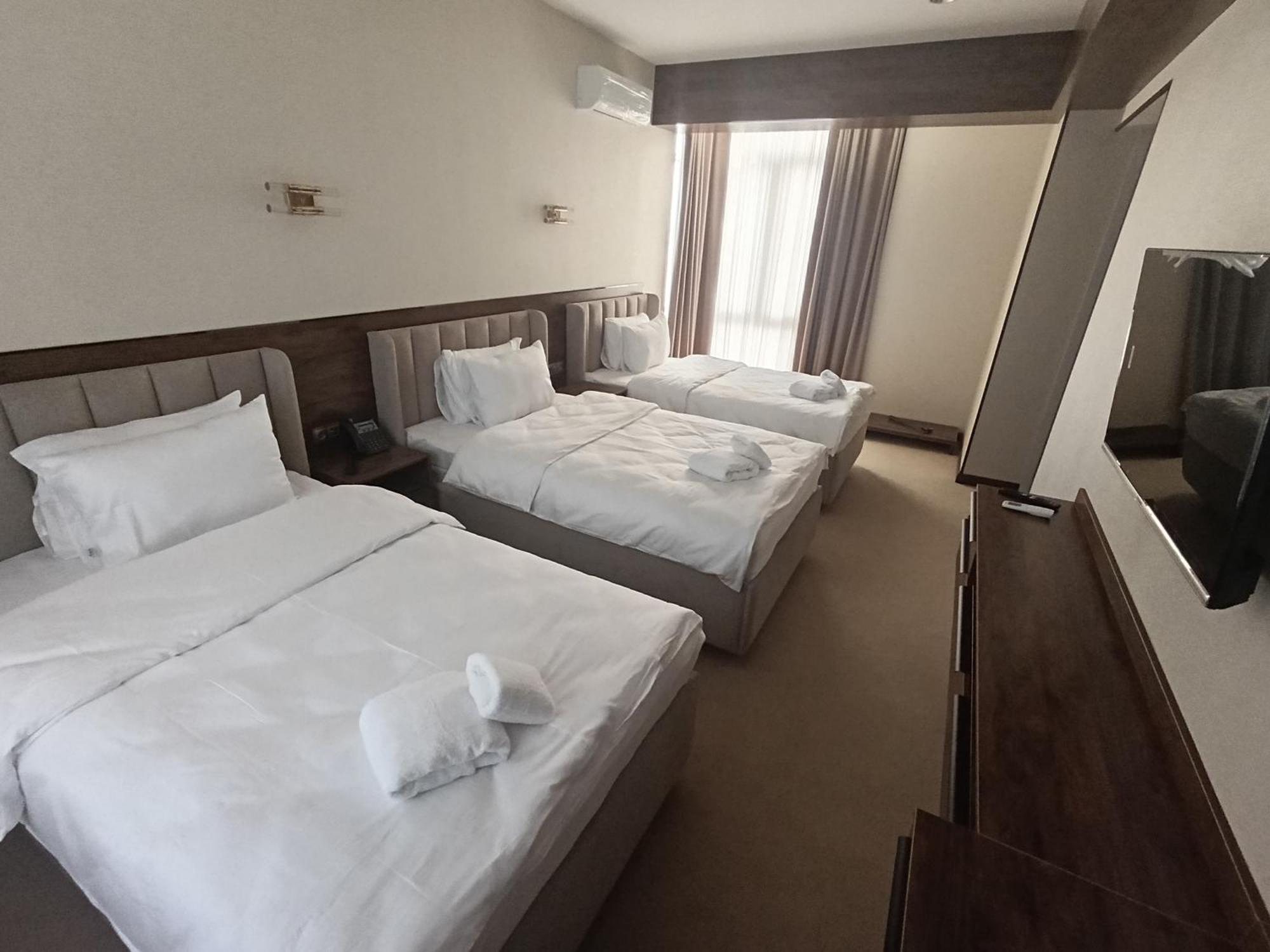Grand Karavan Hotel Tasken Kültér fotó